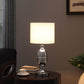 25" Silver Metal Urn Table Lamp With White Drum Shade