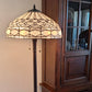 62" Brown And White Two Light Torchiere Floor Lamp With White Geometric Glass Dome Shade
