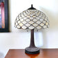 23" Dark Brown Metal Two Light Candlestick Table Lamp With White Shade