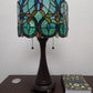 22" Dark Brown Metal Two Light Candlestick Table Lamp With Green Shade