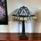 22" Dark Brown Metal Two Light Candlestick Table Lamp With Blue Empire Shade