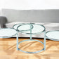 60" Clear And Silver Glass And Steel Round Nested Coffee Tables With Three Shelves