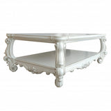 57" Antiqued White Wood Coffee Table With Shelf
