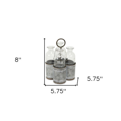 Set of Four Clear Galvanized Metal and Glass Decorative Bottle Tabletop Sculpture