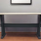 70" Ivory and Black Genuine Marble Trestle Console Table