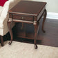 25" Dark Brown Solid And Manufactured Wood Rectangular End Table With Drawer
