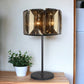 30" Bronze Metal Four Light Cylinder Bedside Table Lamp With Amber Round Shade