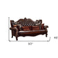 93" Brown Faux Leather Sofa And Toss Pillows With Burgundy Legs