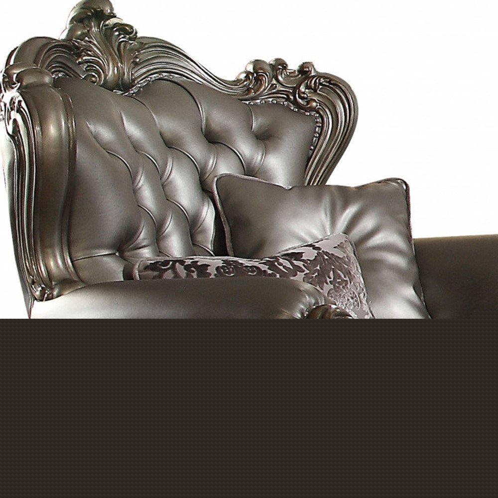 44" Silver and Platinum Faux Leather Tufted Wingback Chair And Toss Pillows