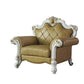 50" Beige and Pearl Faux Leather Tufted Arm Chair And Toss Pillow