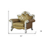 50" Beige and Pearl Faux Leather Tufted Arm Chair And Toss Pillow