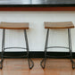 Set of Two 25" Chestnut and Black Solid Wood and Steel Backless Counter Height Bar Chairs
