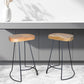 Set of Two 25" Natural and Black Solid Wood and Steel Backless Counter Height Bar Chairs