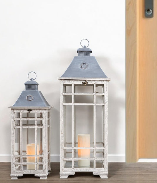 Set of Two White And Silver Distressed Geometric Metal Floor Lantern Candle Holders