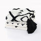 60" X 50" Black and White Woven Cotton Geometric Throw Blanket with Tassels