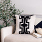 24" Black and Ivory Throw Pillow