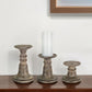 Set of Three Brown Distressed Stone Tabletop Taper Candlesticks