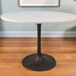40" White And Black Rounded Marble And Iron Pedestal Base Dining Table