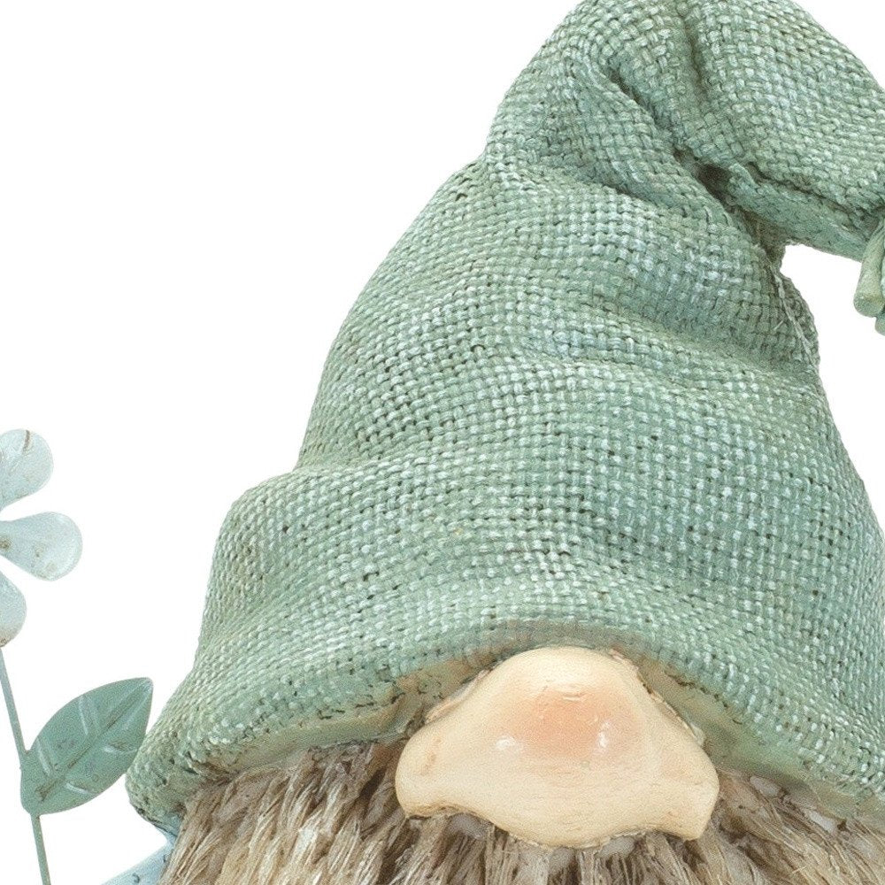 Set of Four Brown And Green Polyresin Gnomes