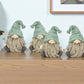 Set of Four Brown And Green Polyresin Gnomes