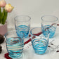 Set of Four Clear and Blue Acrylic Stemless Whiskey Glasses