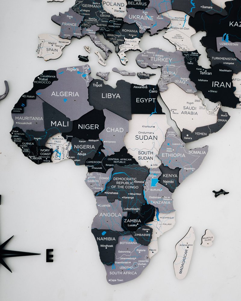 35" X 59" Black Gray and White Wood World Map Hanging Dimensional Sculpture