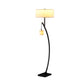 59" Matte Black Dual Arc Floor Lamp With White Drum Shade
