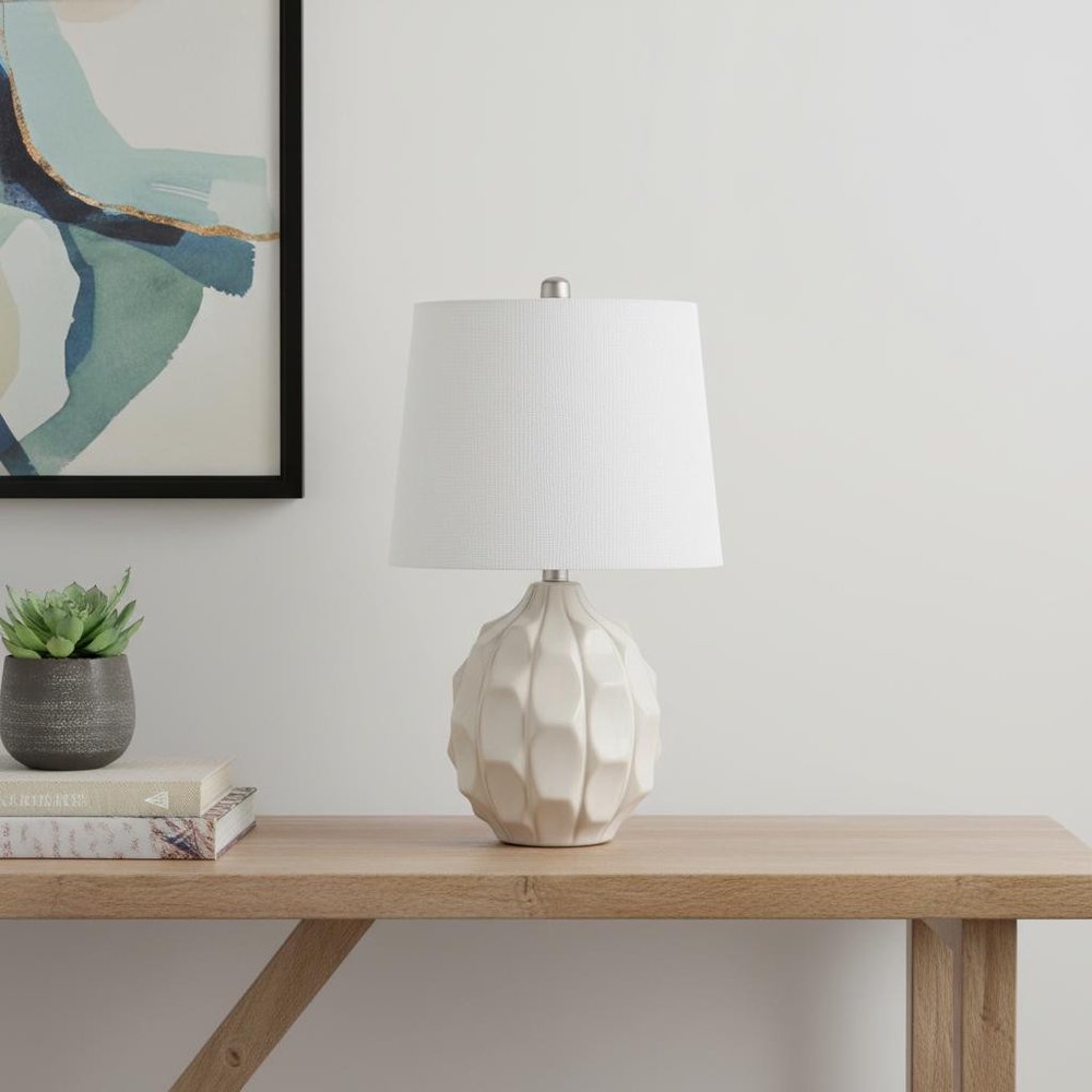 22" Cream Ceramic Faceted Table Lamp With Off White Drum Shade