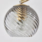 19" Antiqued Brass Metal Desk Lamp With Light Gray Swirl Globe Shade