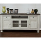 70" Ivory Solid Wood Enclosed Storage Distressed TV Stand