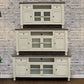 70" Ivory Solid Wood Enclosed Storage Distressed TV Stand