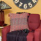 20" Red and Black Cotton Throw Pillow with Tassels