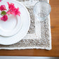19" Set of Four Natural And Ivory Geometric Braided Jute Placemats
