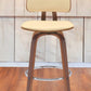 30" Cream And Wood Brown Faux Leather Swivel Low Back Bar Height Bar Chair