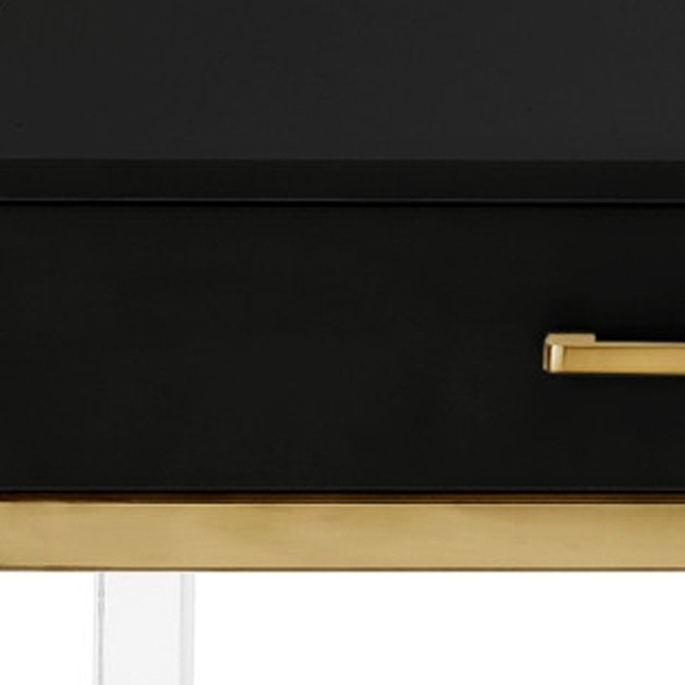 47" Black Gold And Clear Wood Acrylic And Steel Coffee Table