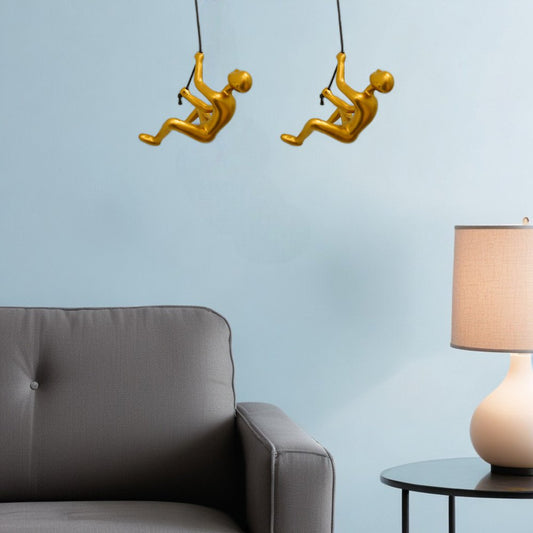 Set of Two Gold Resin Climbing Man Hanging Dimensional Sculpture