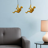 Set of Two Gold Resin Climbing Man Hanging Dimensional Sculpture