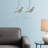 Set of Two Silver Resin Climbing Man Hanging Dimensional Sculpture