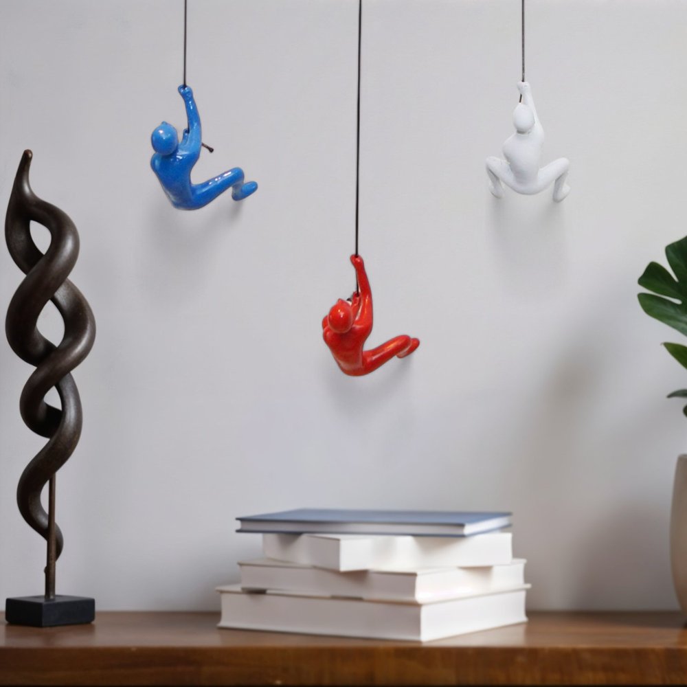 Set of Three Blue Red And White Resin Climbing Man Hanging Dimensional Sculpture