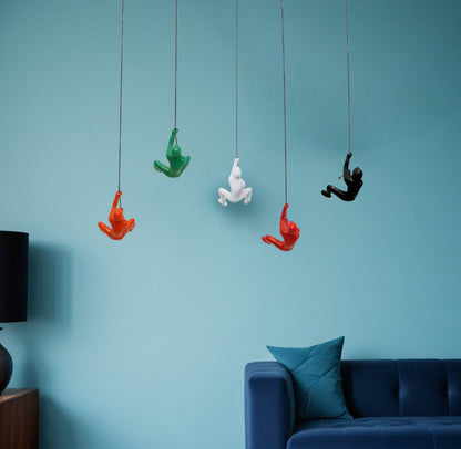 Set of Five Black Green Orange Red And White Resin Climbing Man Hanging Dimensional Sculpture