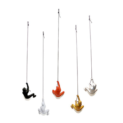 Set of Five Black Gold Orange Silver And White Resin Climbing Man Hanging Dimensional Sculpture