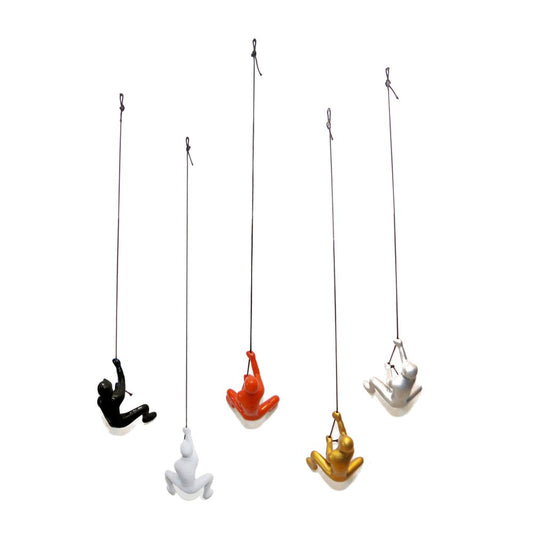 Set of Five Black Gold Orange Silver And White Resin Climbing Man Hanging Dimensional Sculpture