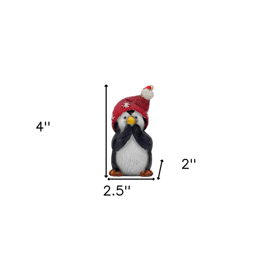 Set of Three Black White And Red Resin Penguin Christmas Reindeer Figurine