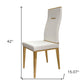 Set of Four White and Gold Upholstered Faux Leather Dining Side Chairs