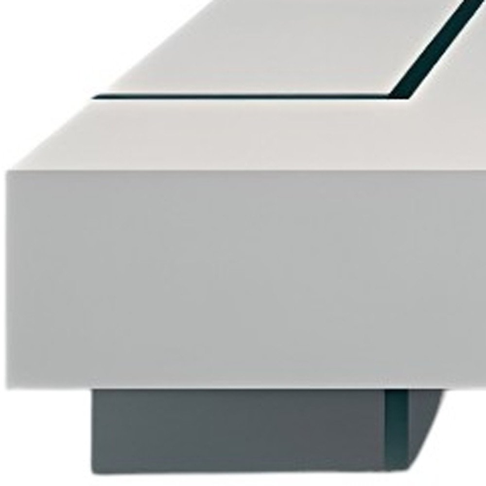 53" White And Clear Wood And Glass Sled Coffee Table