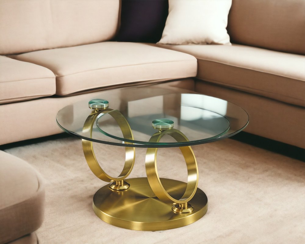 32" Clear And Gold Glass And Metal Round Abstract Coffee Table