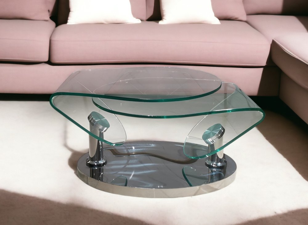 30" Clear And Silver Glass And Metal Oval Abstract Coffee Table