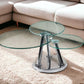 32" Clear And Silver Glass And Metal Round Floor Shelf Coffee Table