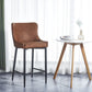 Set of Two 26" Orange and Black Metal and Faux Leather Low Back Counter Height Bar Chairs
