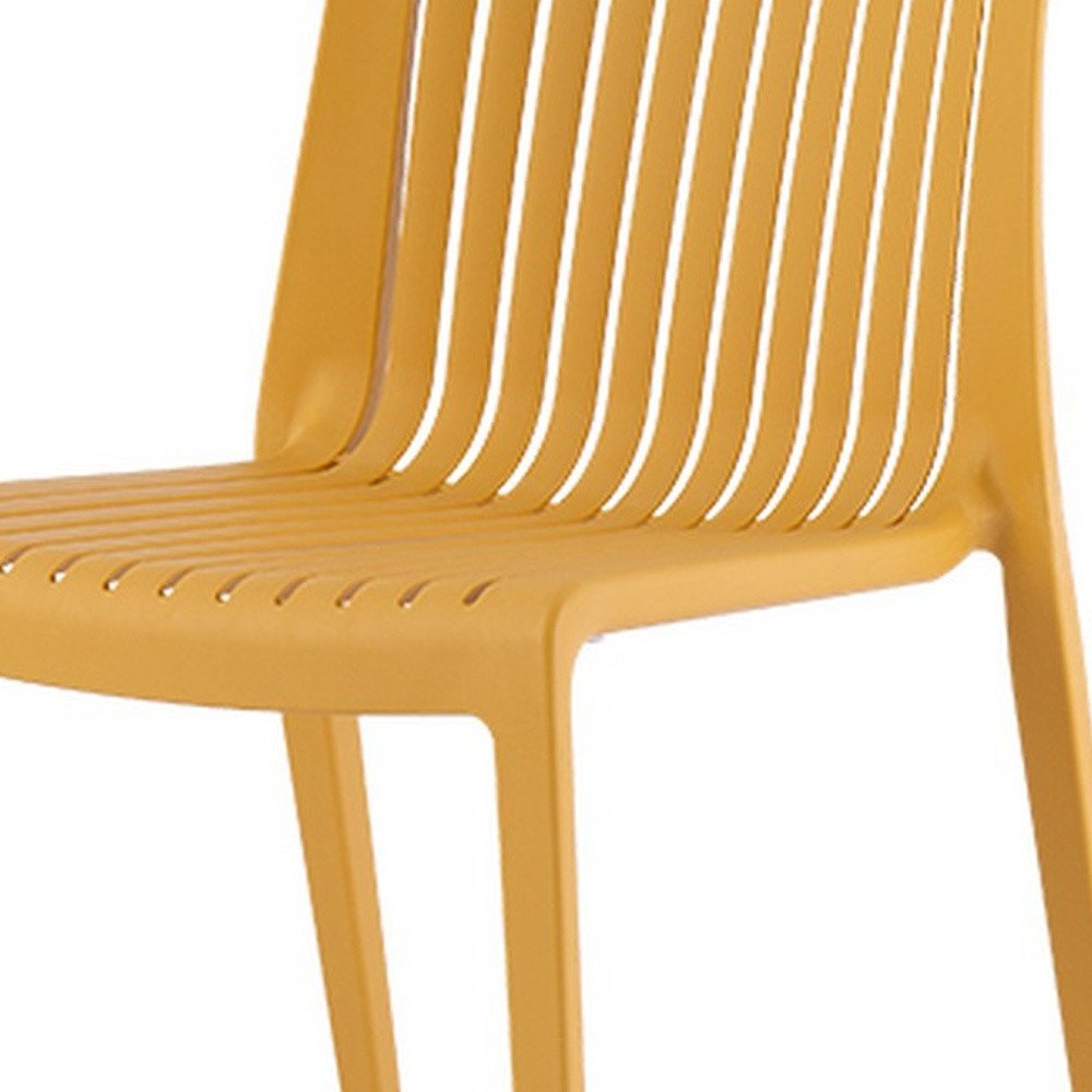 Set of Two Gold Heavy Duty Plastic Outdoor Stacking Accent Chairs